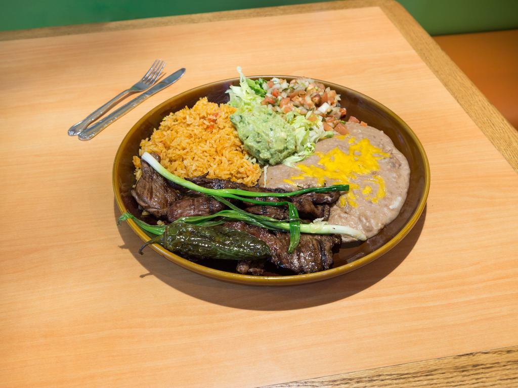 29. Carne Asada · Skirt char-broiled steak, served with pico de gallo and guacamole.