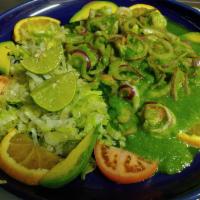 58. Aguachile · Hot. Shrimp cooked in lime juice with red onions in a spicy green sauce. Served with lettuce.