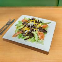 Carne Asada Salad · Lettuce, tomatoes, cheese, sliced avocado with skirt steak.
