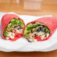 Greek Chicken Wrap · Greek chicken, romaine lettuce, feta cheese, tomato and black olives with Greek dressing. Se...