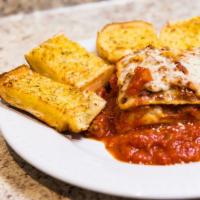Lasagna · Served with garlic bread and small garden salad.