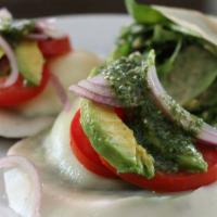 Caprese Salad · Fresh mozzarella, tomato, and fresh basil. Full size.
