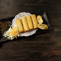 Vegetables Egg Rolls · Glass noodle, carrot and cabbage served with sweet chili sauce.