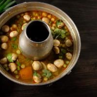 Pot Tom Yum Soup · Thai hot and sour soup with mushroom, white onion, lemongrass, kaffir lime leaves, galangal ...