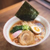 Shoyu Ramen · Classic, soy sauce flavored chicken broth enhanced with umami, with roasted pork, egg, bambo...