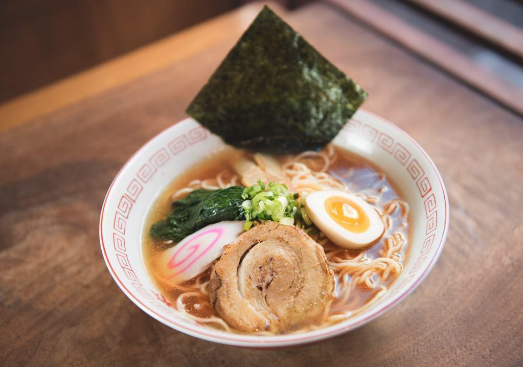 Shoyu Ramen · Classic, soy sauce flavored chicken broth enhanced with umami, with roasted pork, egg, bamboo shoot, fish cake, scallions and seaweed