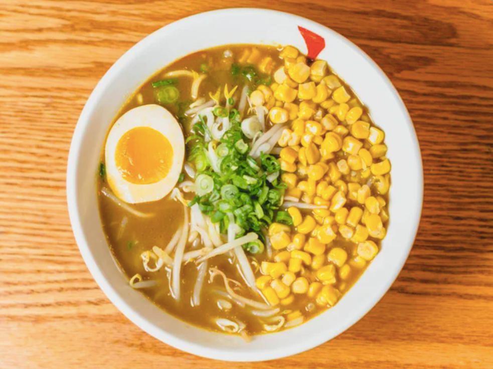 Curry Ramen · Vegetarian ramen in housemade curry soup w/ corn, bean sprouts, scallions & egg. Croquette & cheese recommended.