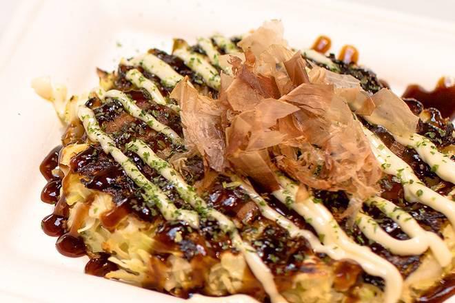Plain Okonomiyaki · Savory pancakes with crunchy cabbage & a variety of fresh ingredients, special sauce, mayo & ‘dancing' bonito flakes for garnish. 