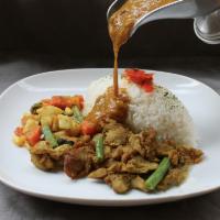 Grilled Chicken Curry · Pan-grilled seasoned chicken served w/ curry, rice and assorted vegetables.  