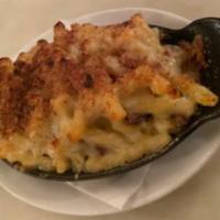 Mac and Cheese with Smoked Bacon  · Baked with Gruyere, white cheddar, smoked heritage pork bacon, and garlic breadcrumbs.
