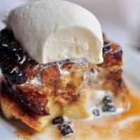 Bread Pudding  · Bourbon caramel sauce, currants, and whipped cream.
