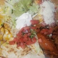 Fiesta Sampler · Buffalo wings, quesadillas, taquitos bites, cheese nachos.