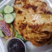Pechuga Asada/Grill ck breast · Grilled chicken breast. Served with salad, rice and beans.