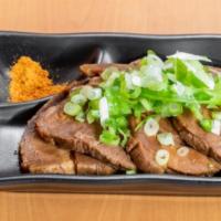Premium Yakibuta · Smoky yet sweet marinated pork in thick slices for that perfect mouthful.