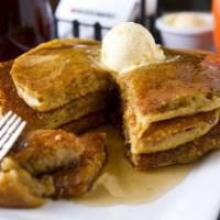 Original Pancakes · Three fluffy pancakes made with house created batter, served with honey butter and a side of...