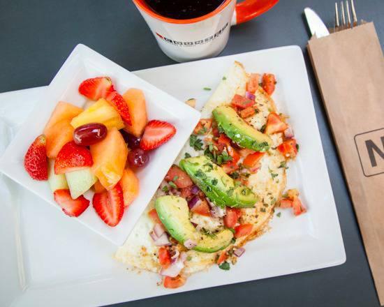 Morning Glory · egg white omelette served with marinated roma tomatoes, cilantro, avocado, and red onion served with grilled potatoes