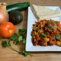Phoenix Saute (plant based) · potatoes, zucchini, onion, tomatoes, vegan mozzarella, and Morning Star soy chorizo, served ...