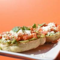 Bravocado · Ciabatta toast topped with avocado, roma tomatoes, feta cheese, and cilantro