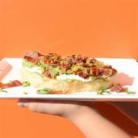Jalapeno Popper Toast · Thick rustic toast topped with cream cheese, avocado, jalapeño slices, crumbled bacon, and c...