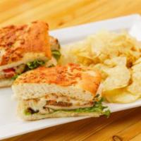 Focaccia Roma-Chicken · Grilled chicken, marinated roma tomatoes, balsamic mayo, lettuce, and provolone on fresh bak...