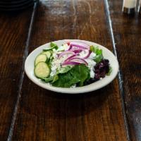 Greek Salad · Romaine lettuce, feta cheese, grape tomatoes, cucumbers, onions, black olives, and Greek dre...