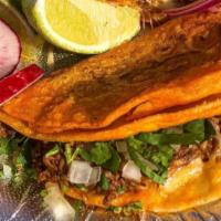 Tacos Dorados · A crunchy taco filled with beef birria, onion and cilantro will come on the side. Comes with...