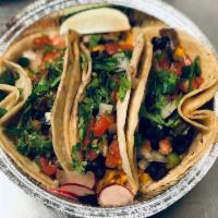 Breakfast vegan  · 3 tacos served with black beans, rice, pico de Gallo, onions and  cilantro