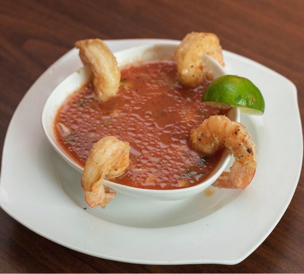 Gazpacho · 36 onz . ( tomato soup , onions, tomate and jalapeno  with a touch of valentina sauce ) 