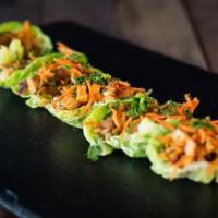 Thai Lettuce Cups · Grilled chicken, Thai sweet chili sauce, wonton strips, red onion, cucumber, carrot and cila...