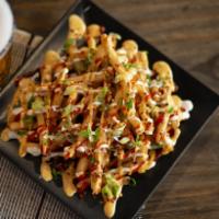 Asian Style Fries · Crispy beer-battered fries, topped with ranch, spicy ranch, Sriracha, green onions, bacon bi...