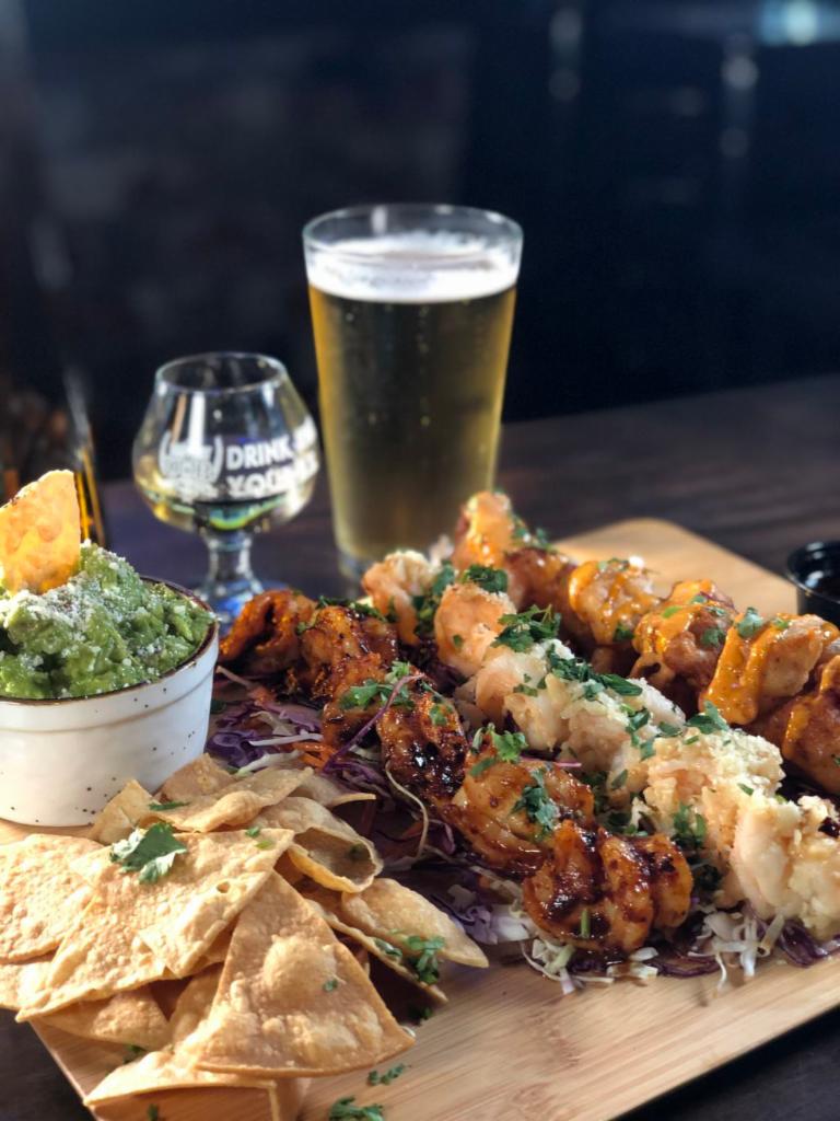 Shrimp Trio · 18 Prawns smothered in 3 of our favorite sauces: 6 Craft Beer-Battered, 6 Garlic-Butter, and 6 Chili Diablo Jumbo Prawns. Served with fresh chips and our house-made guacamole. 