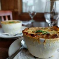 French Onion Gratinee Soup · Caramelized onions, crouton, Swiss cheese