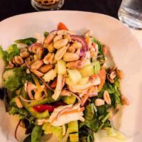Chicken Salad · Slice chicken tossed with fresh ginger, peanuts, and onion in a spicy dressing.