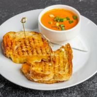 Grilled Cheese Sandwich with Tomato Soup · Havarti and cheddar cheese on rustic sourdough.