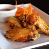 A9 Chicken Wings · Special marinated deep fried chicken wings. Served with sweet chili sauce