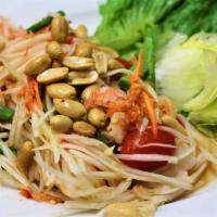 S2. Papaya Salad · Shredded green papaya, shrimp, tomatoes, green beans, garlic, and Thai chili tossed with tas...