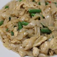 N3. Pad Kee Mao · Stir fried flat rice noodles, green bean, Thai basil, Thai chili, and garlic with a special ...