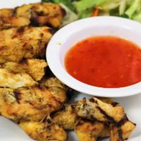 G2 Gai Yang · Grilled marinated chicken breast. Serve with grill vegetables and sweet chili sauce.