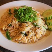 R2. Basil Fried Rice · Stir fried choice of meat, rice, bell peppers, basil, egg with Thai chili, and a special soy...