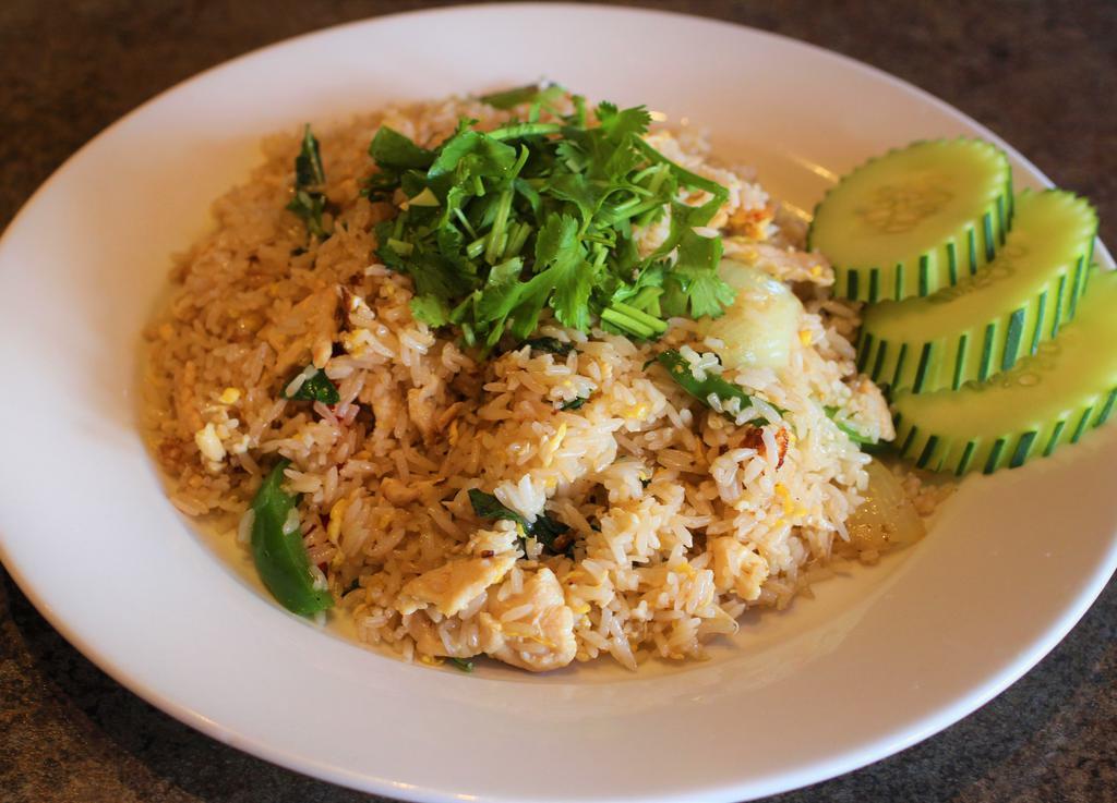 R2. Basil Fried Rice · Stir fried choice of meat, rice, bell peppers, basil, egg with Thai chili, and a special soy sauce mix. Medium Spicy.