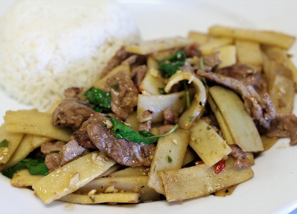 R11. Pad Nor Mai (Bamboo) · Bamboo shoot stir-fried with choice of meat; Thai chili, garlic, serranos pepper and basil in soy sauce. Served with white rice. Medium Spicy.