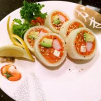 KC Roll · Raw. Salmon, avocado, crab stick, and cream cheese, wrapped in thin-cut cucumber.