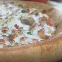 Chicken Royale Pizza · Garlic white sauce, chicken, pineapple, red onion, green peppers, tomatoes and mozzarella ch...