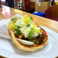 Falafel Souvlaki · Lettuce, tomato, onion, tahini sauce and tzatziki sauce. Served on pita bread.