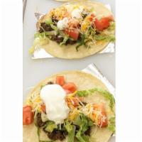 Ground Beef Taco · Served on a hard or soft corn shell. Build your own!