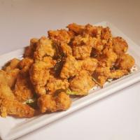 Popcorn Chicken · Tender chicken tight meat twice fried with fresh basil.