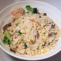 House Special Fried Rice · Shrimp, Beef and chicken, egg, green onion, broccoli and corn.