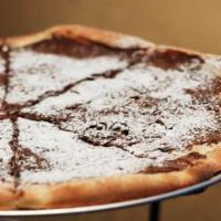 Nutella Sweet  · Fresh baked pizza topped with warm Nutella chocolate and powdered sugar.