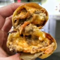 1 Korean Philly Cheesesteak Eggroll · Our house made eggroll is packed with beef bulgogi and a blend of melty cheeses!