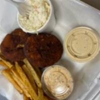 Crab cake platter · 2 fried crab cakes, house made fries, coleslaw served with a choice of cocktail sauce, tarte...
